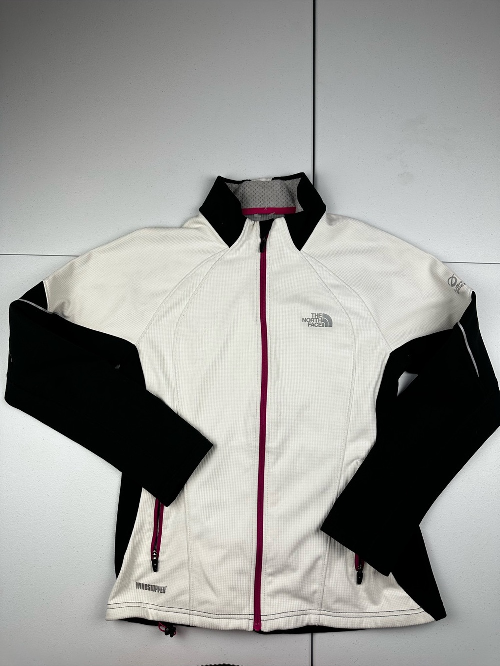 The North Face Women's White Jacket with Black Sleeves and Pink Zipper